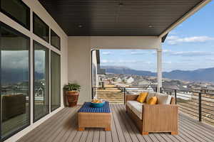 Balcony with a residential view and a mountain view