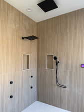 Laundry area featuring a textured ceiling