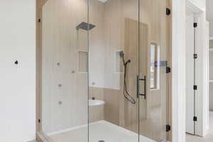 Bathroom featuring a stall shower