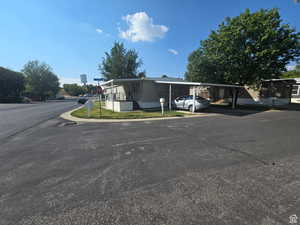 View of front of home with a carport