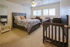 Bedroom with carpet floors and ceiling fan