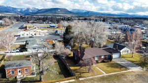 Aerial view of residential area with a mountainous background