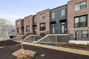Modern home with brick siding