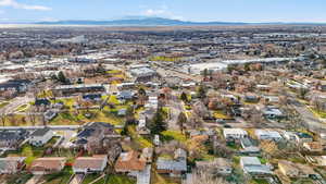 View of property location featuring a mountain backdrop and nearby suburban area
