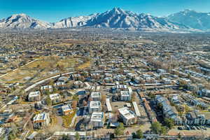 View of property location featuring a mountain backdrop and nearby suburban area