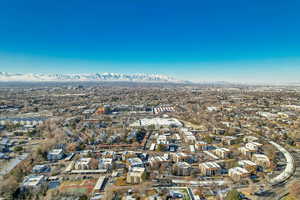 Aerial view of property's location featuring mountains
