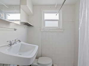 #29 (Basement Studio): 3/4 bathroom featuring a shower with shower curtain