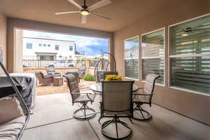 Sunroom featuring a textured wall