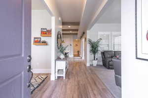 Entrance foyer featuring wood finished floors and recessed lighting