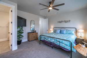 Bedroom featuring carpet floors and a ceiling fan