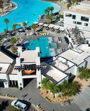 Drone / aerial view of a large body of water and a pool