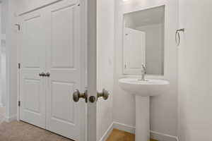 Bathroom featuring baseboards