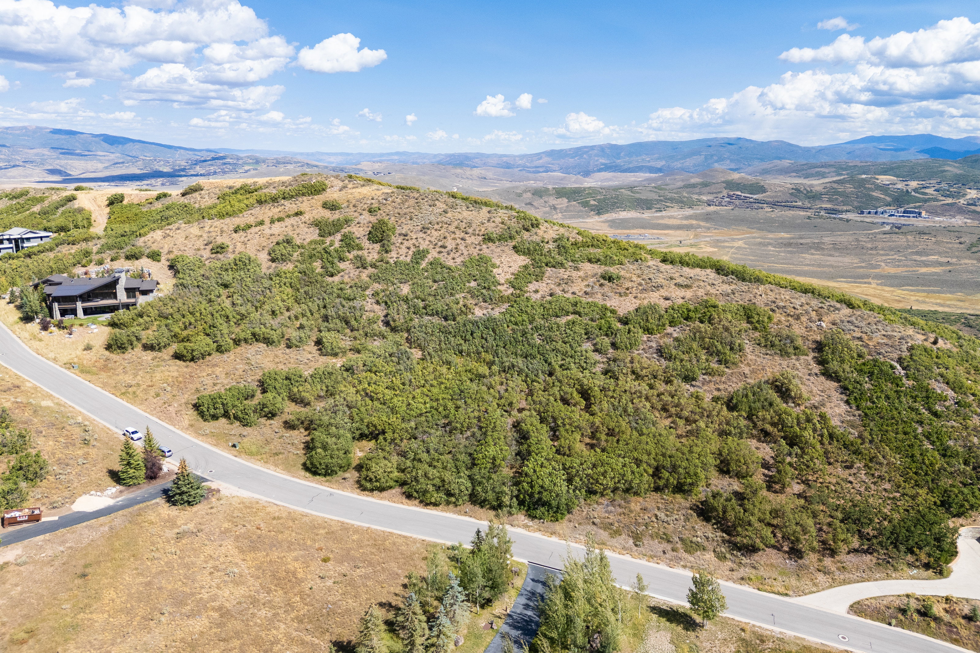 Drone / aerial view of a mountain backdrop