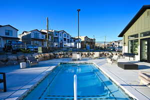 View of pool featuring a patio