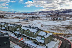 Aerial views SE with a mountain view