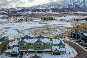 Aerial view S of a mountainous background