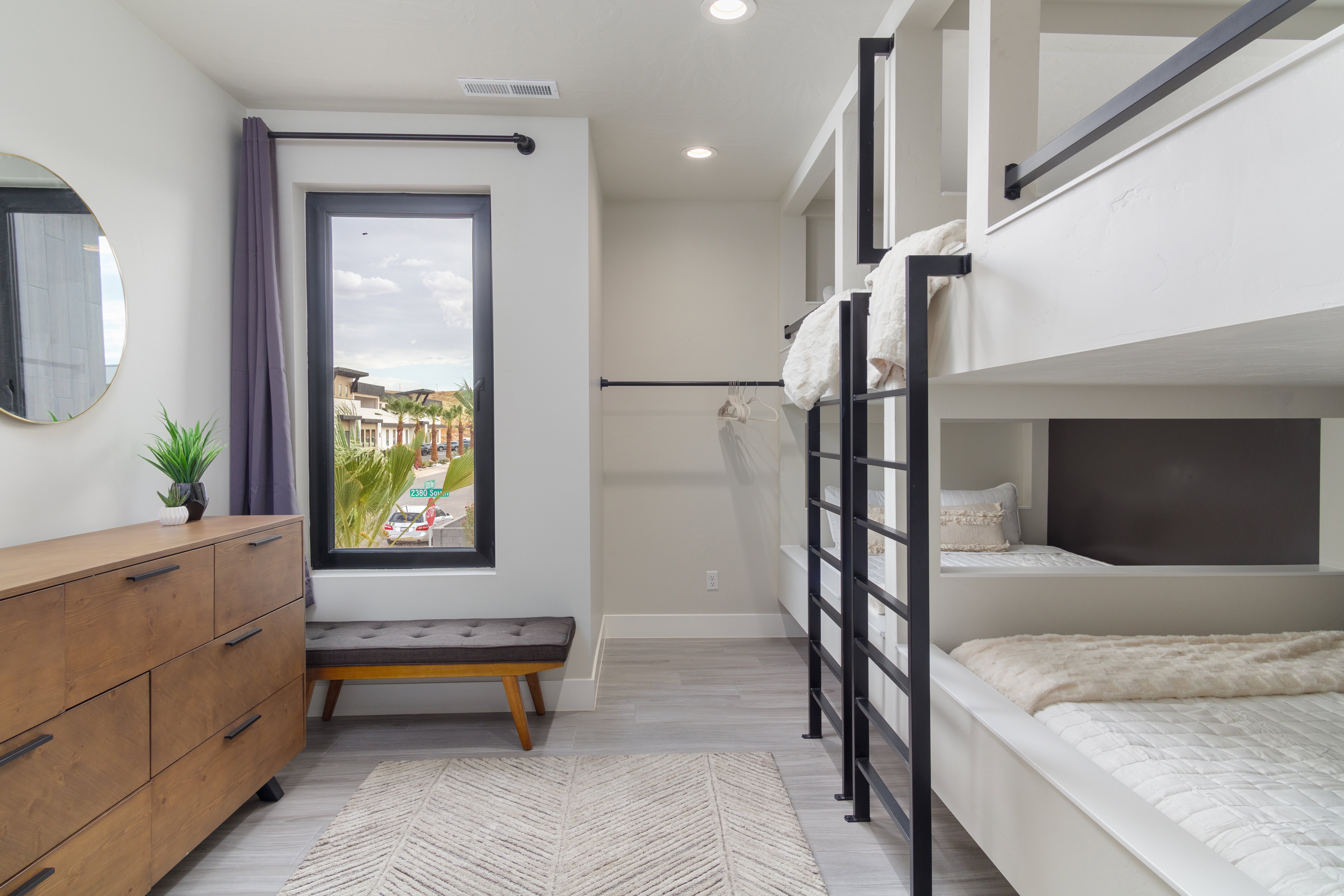 Bedroom with light wood-style flooring and recessed lighting