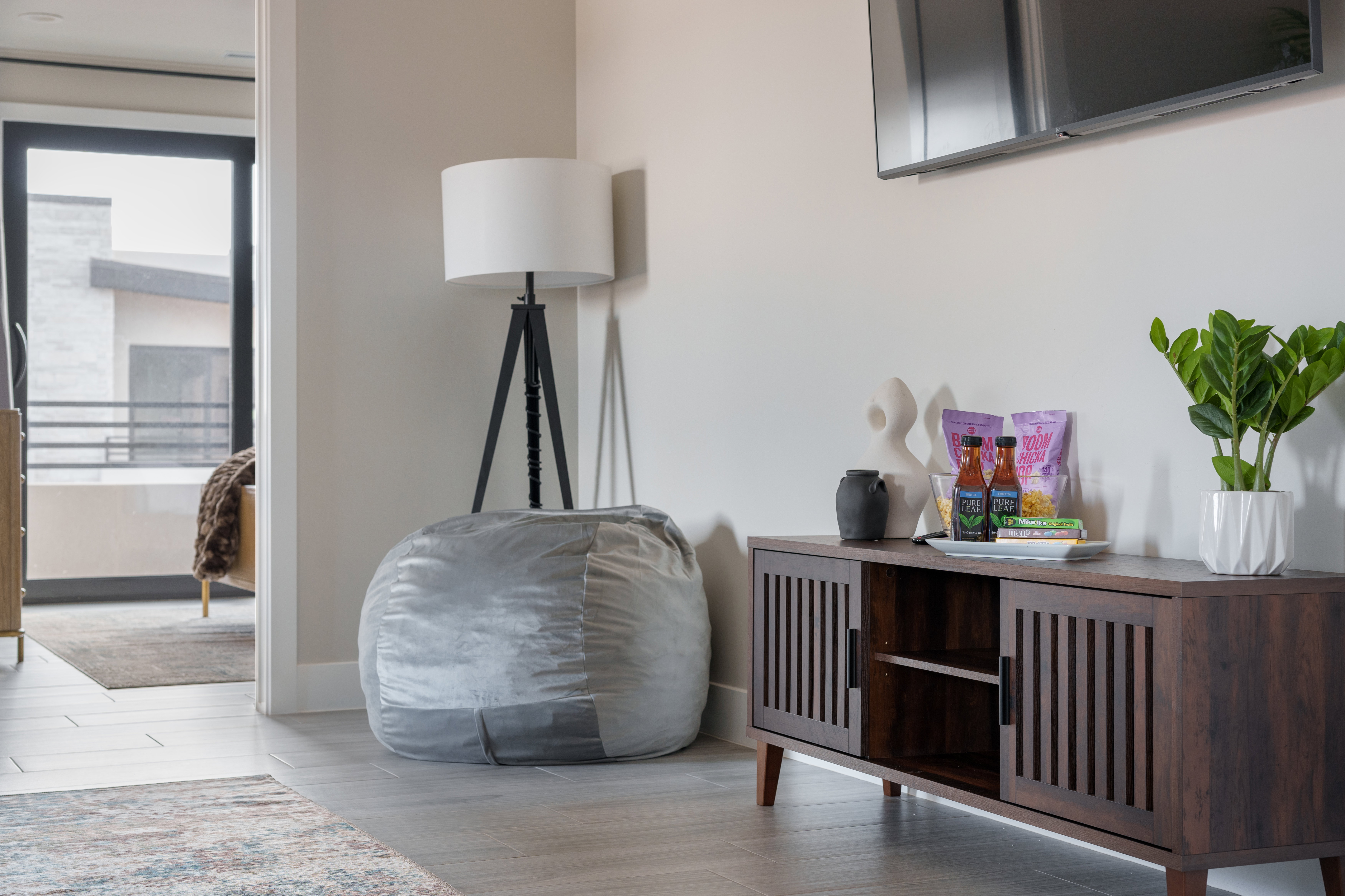 Living area with wood tiled floors and baseboards