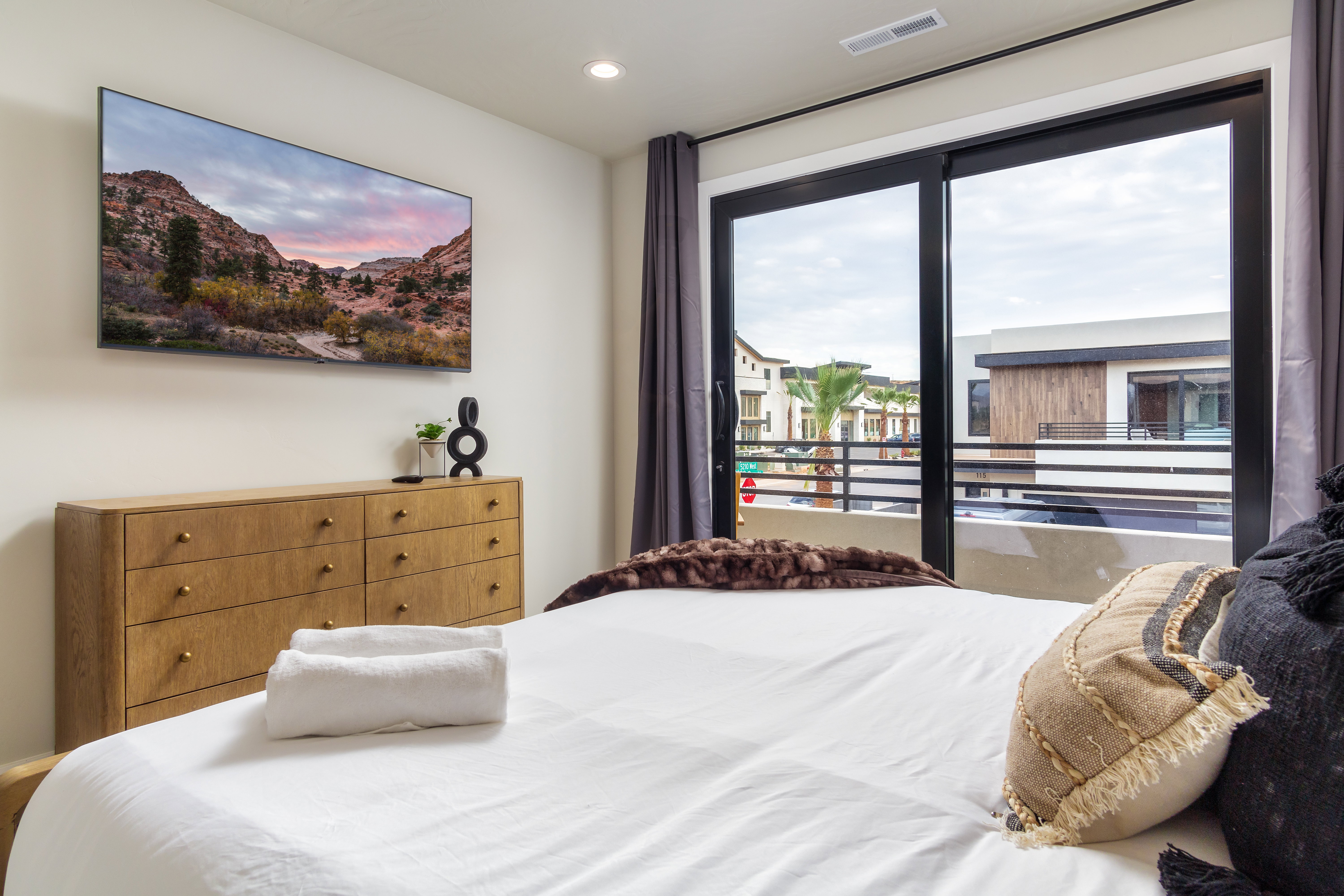 Bedroom with access to exterior and recessed lighting