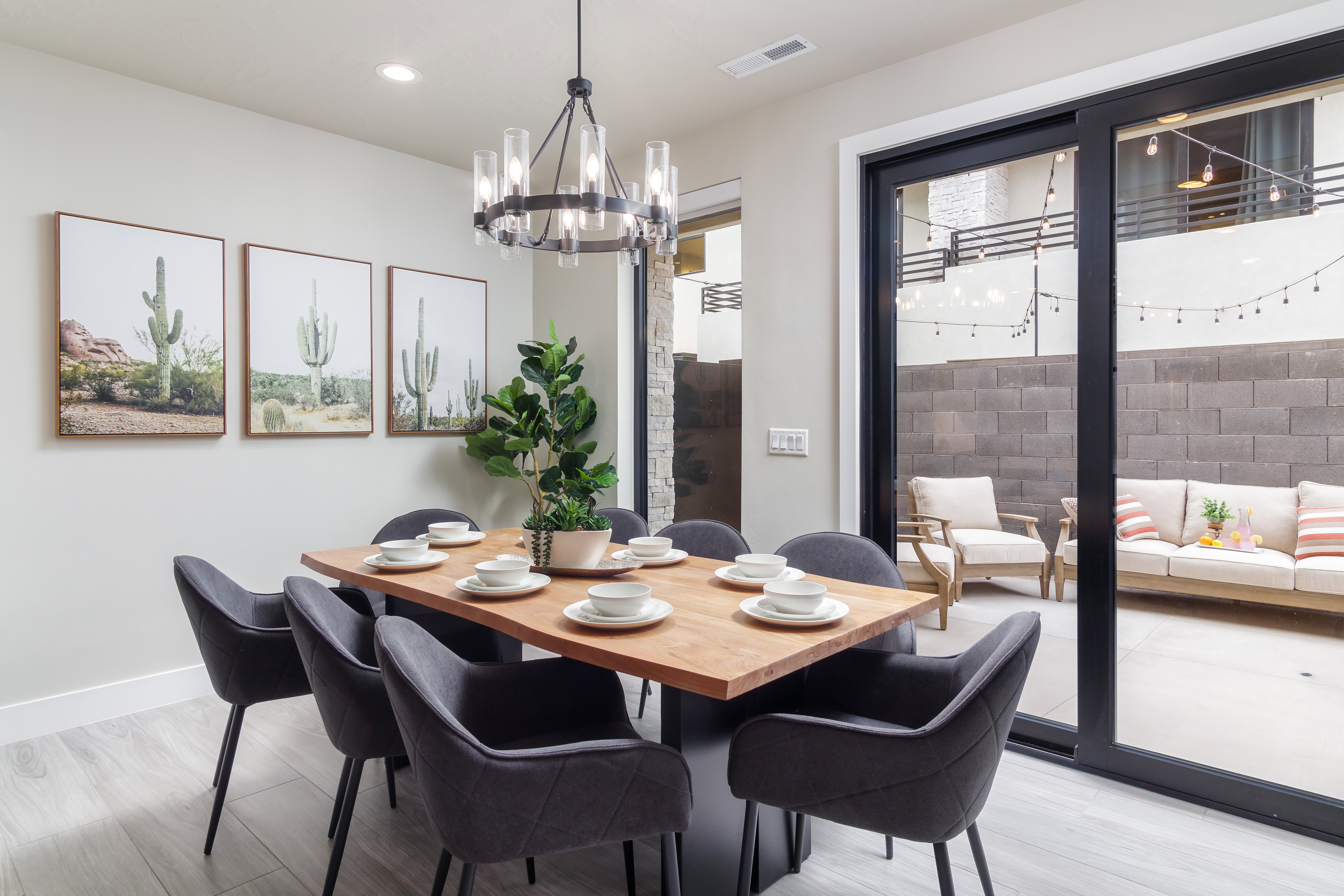 Dining space featuring a chandelier, light wood finished floors, and recessed lighting
