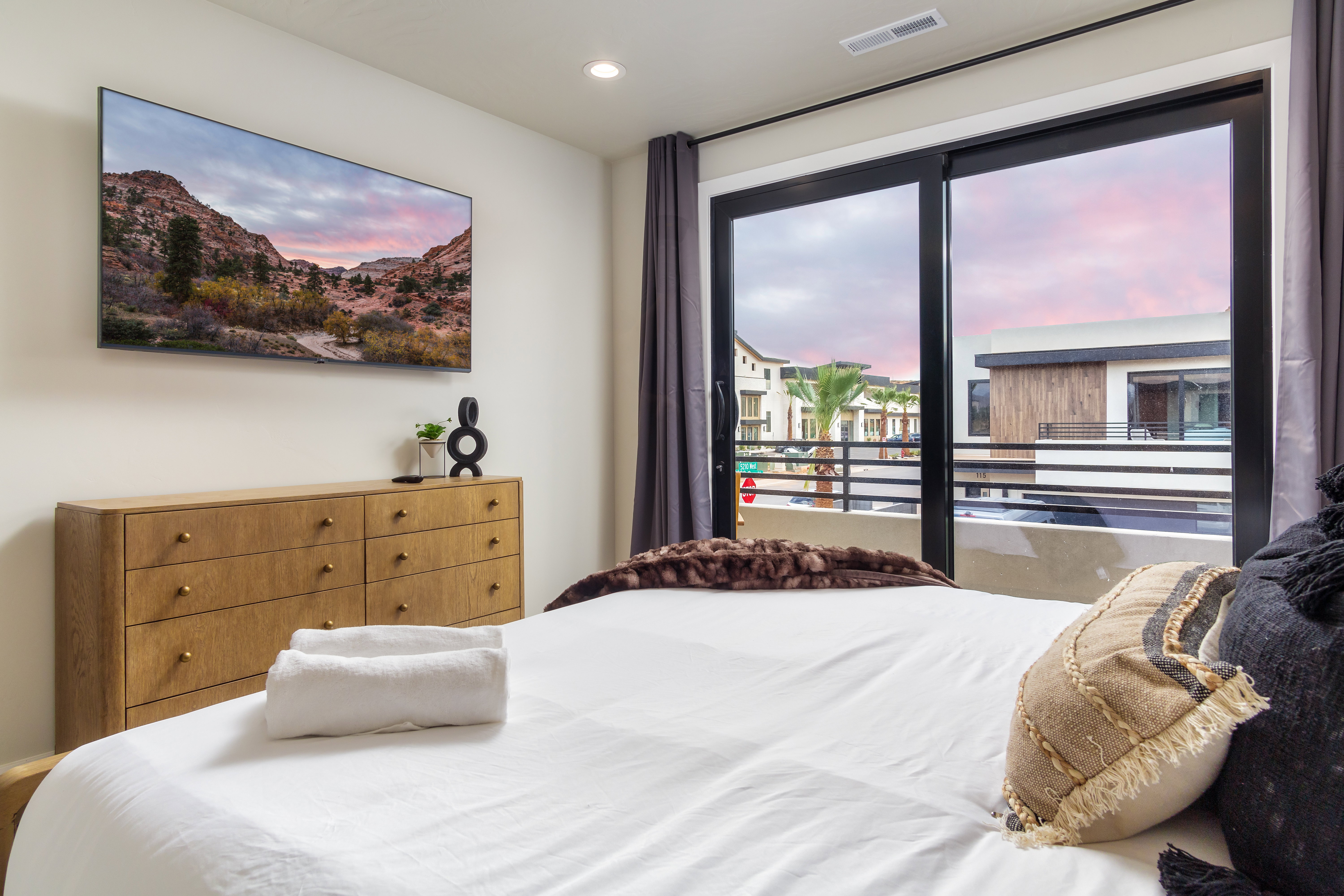 Bedroom featuring access to exterior and recessed lighting
