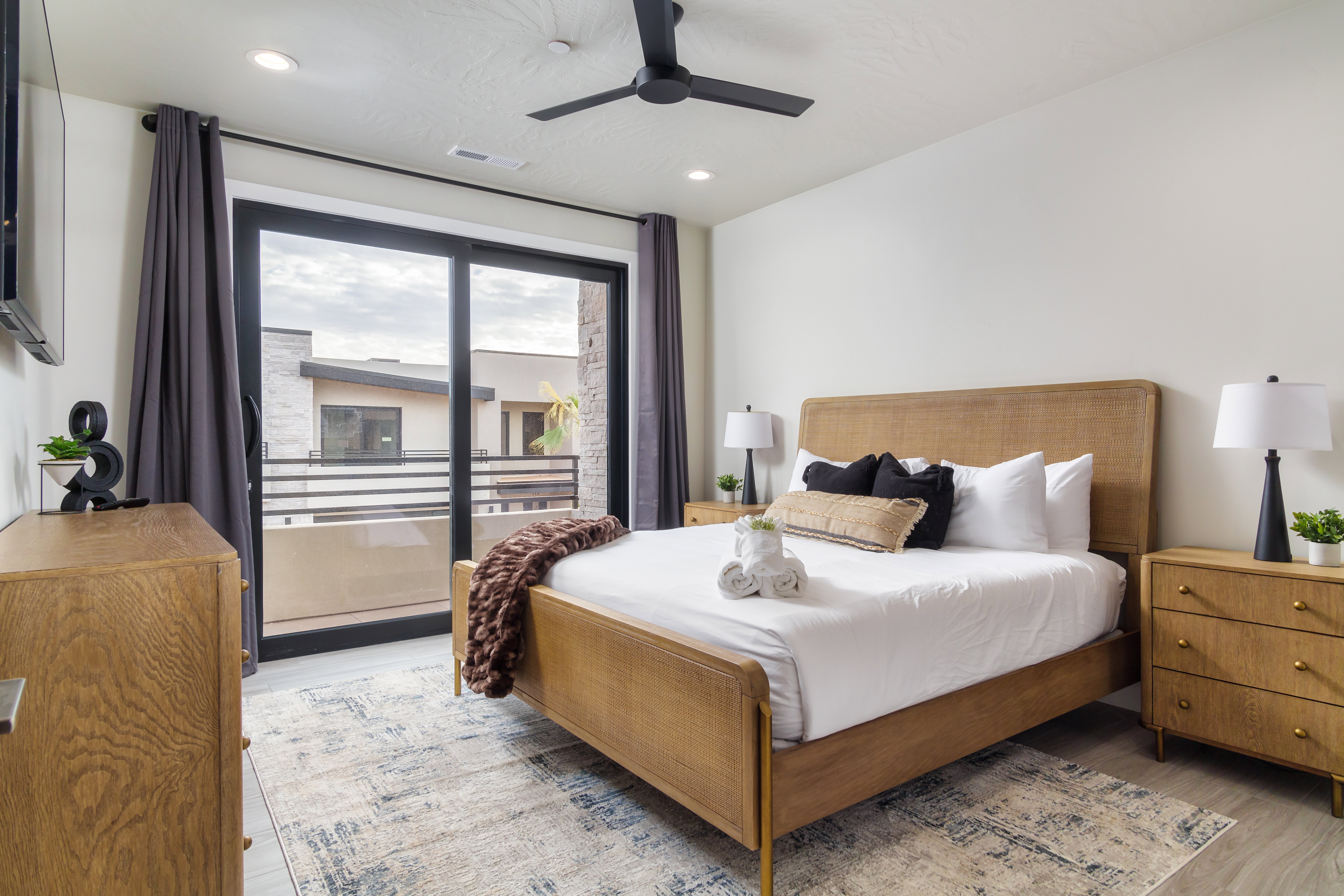 Bedroom featuring a ceiling fan, light wood-style flooring, and recessed lighting