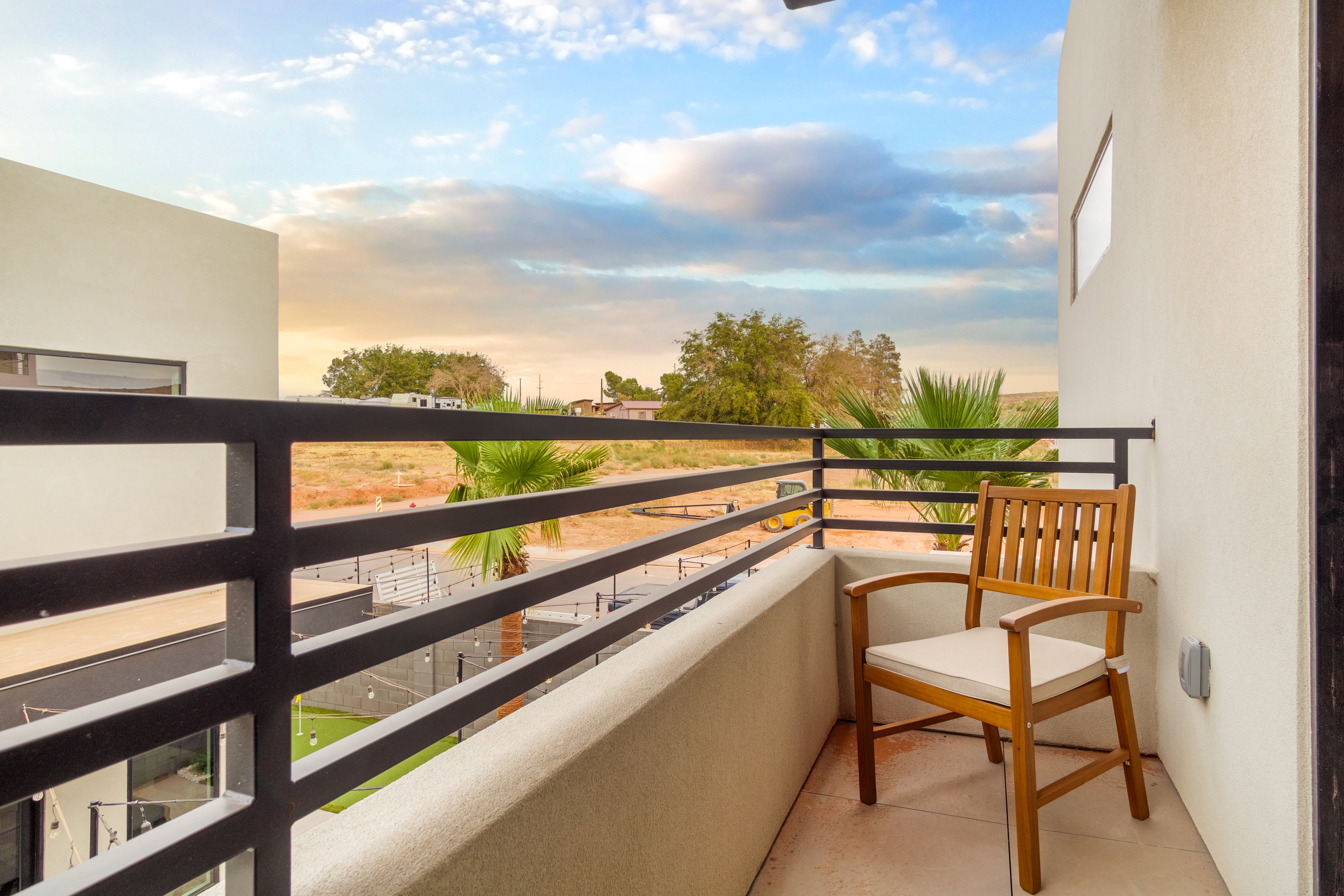 View of balcony at dusk