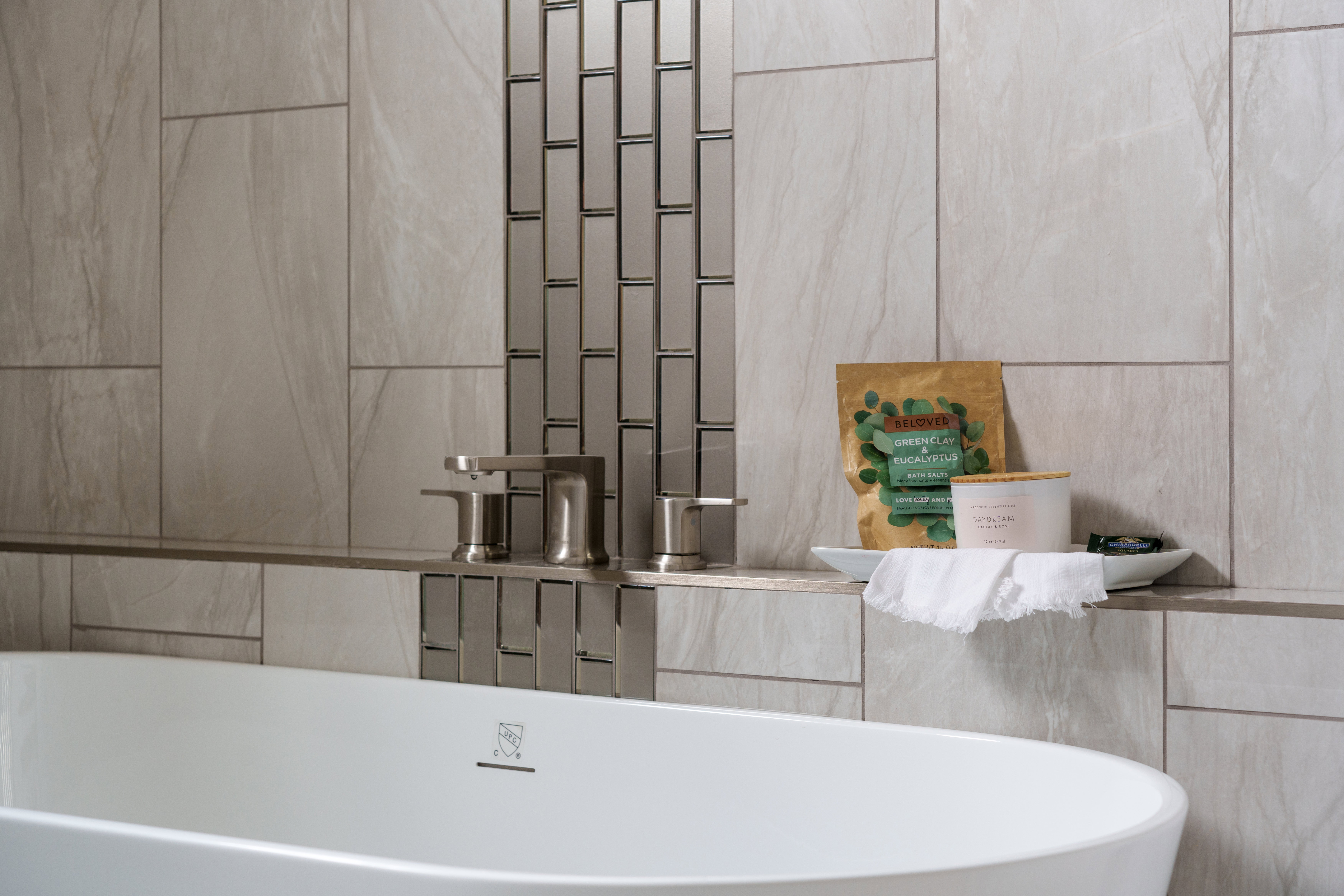 Bathroom view of a freestanding bath and a sink
