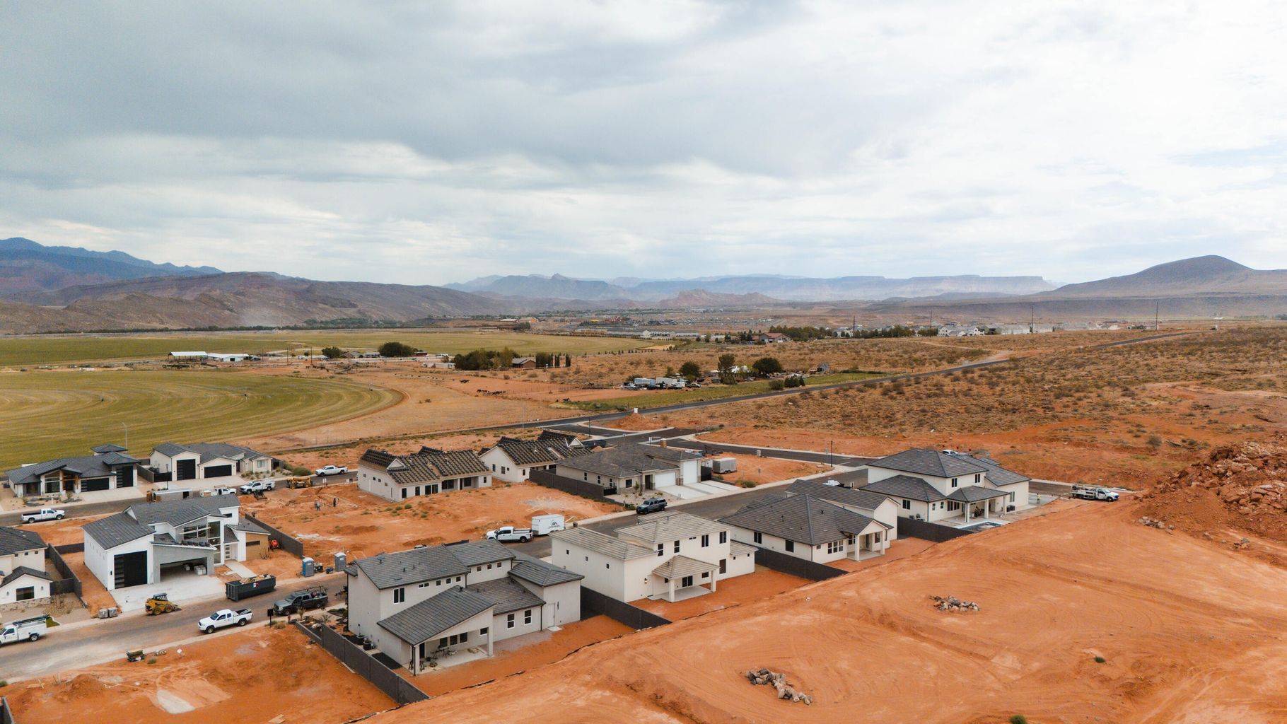 Aerial perspective of suburban area featuring mountains