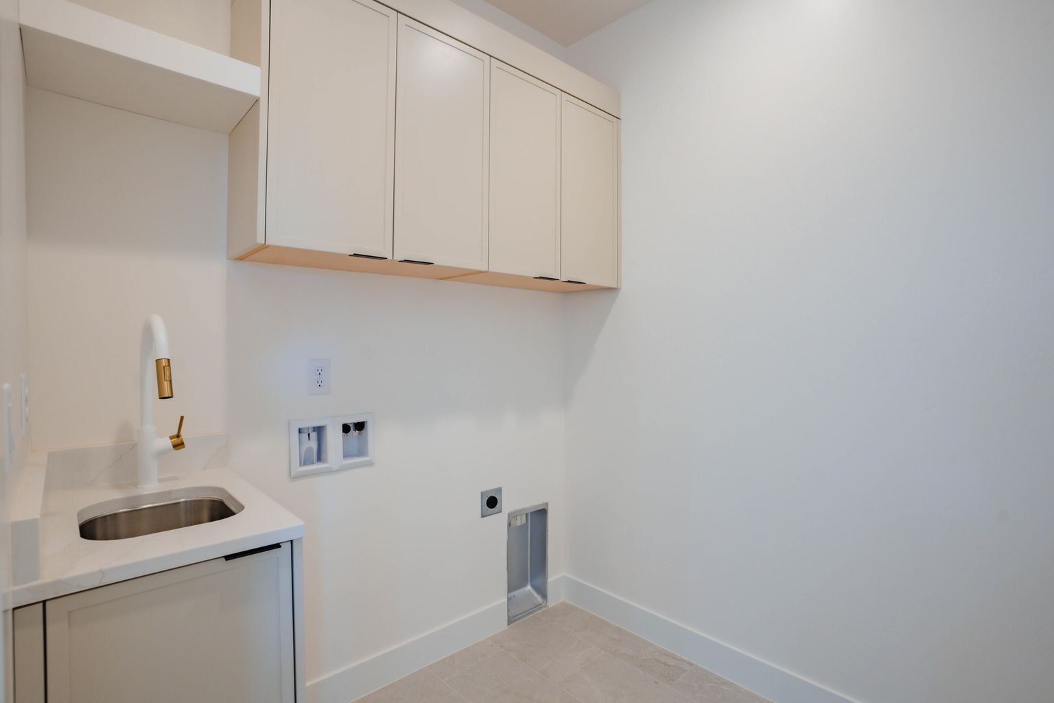 Laundry room with cabinet space, washer hookup, and hookup for an electric dryer