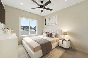 Bedroom featuring ceiling fan, recessed lighting, and light colored carpet