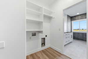 Walk-in closet with laundry hook-ups