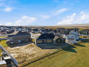 Aerial perspective of back of house and yard
