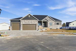 Craftsman inspired home featuring RV garage and parking.