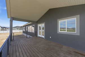 Wooden deck with a residential view