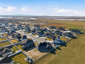 Aerial perspective of suburban area with a mountain backdrop