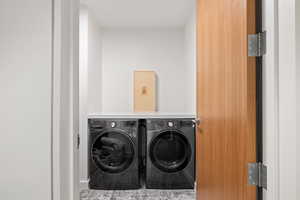 Laundry room with washing machine and dryer