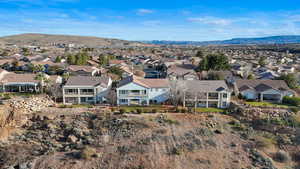 Aerial view of residential area with a mountainous background