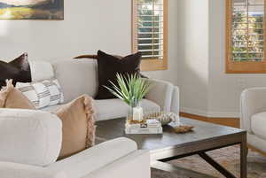 Living area featuring wood finished floors and healthy amount of natural light