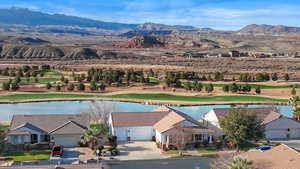 Bird's eye view of a water and mountain view and a local golf course