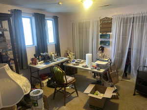 View of carpeted home office