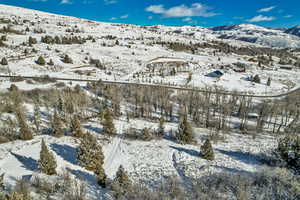 Snowy aerial view with a mountain view