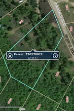 Aerial view of property's location with property parcel outlined