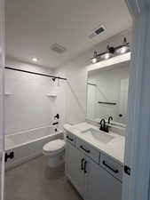 Full bathroom featuring vanity, bathing tub / shower combination, light tile patterned floors, and recessed lighting