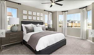 Bedroom featuring a ceiling fan and carpet floors