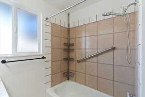 Bathroom featuring  shower combination