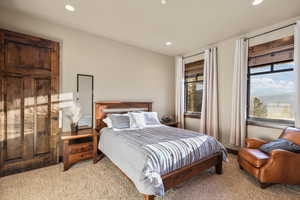 Bedroom with carpet flooring and recessed lighting
