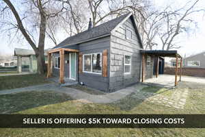 View of front of house with roof with shingles