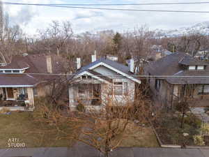 View of front facade featuring a chimney