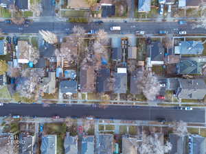 Aerial view of property's location with nearby suburban area